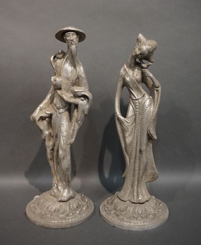 Couple d'indochinois en métal. 44 cm et 45...