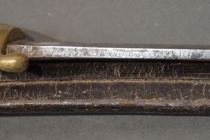 Sabre et son fourreau. Gravé 1814 sur la...
