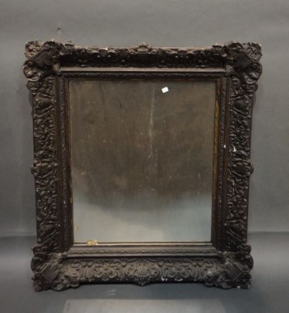 Miroir en bois et stuc à patine noire de...