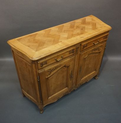 Moulded and carved natural wood sideboard...