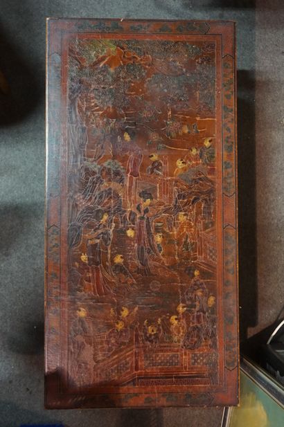 Asian coffee table in brown lacquered wood...
