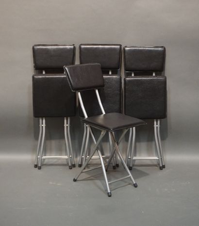 Four small folding chairs in metal and black...