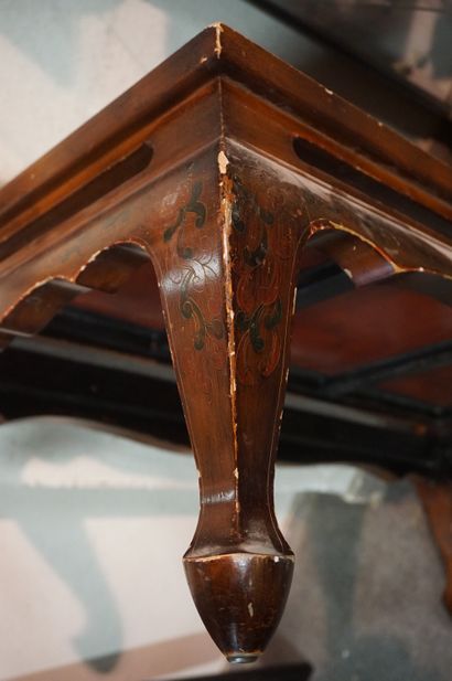 Asian coffee table in brown lacquered wood...