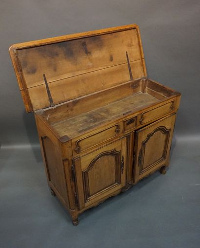 Buffet in molded natural wood, with two doors...