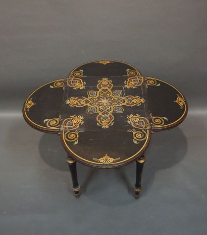 19th-century table in blackened wood, with...