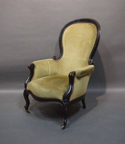 Blackened wood bergère upholstered in green...