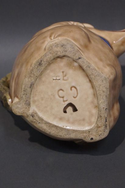 Earthenware pig pitcher (chips). 21 cm