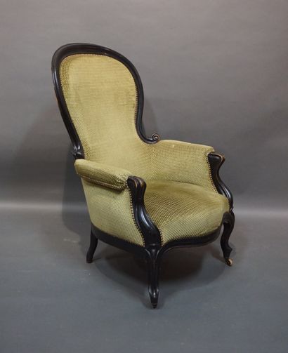 Blackened wood bergère upholstered in green...