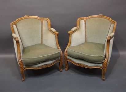 Pair of bergères in molded natural wood,...
