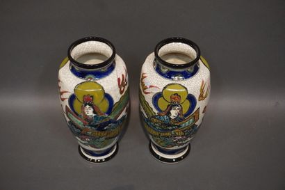 Pair of Asian earthenware vases with figures...