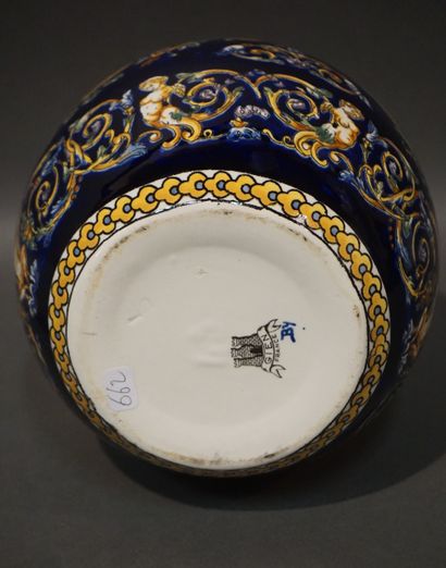 Gien earthenware ball vase with Berain decoration....