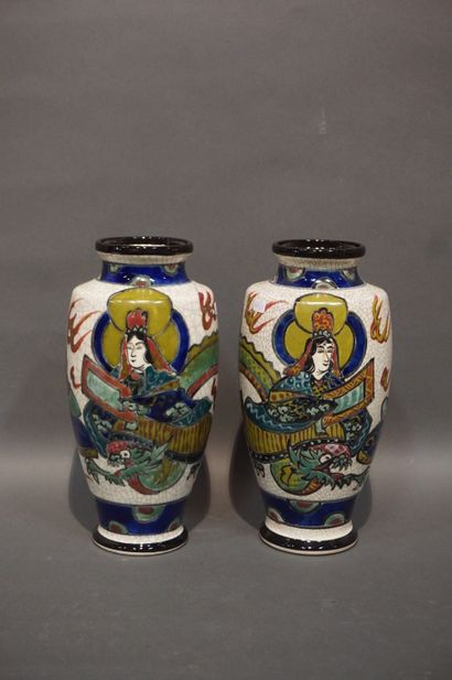 Pair of Asian earthenware vases with figures...