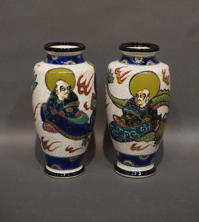 Pair of Asian earthenware vases with figures...