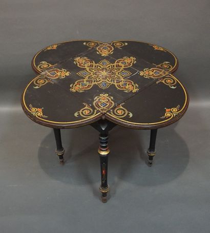 19th-century table in blackened wood, with...