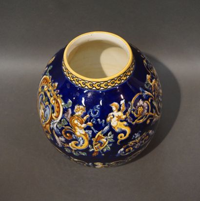 Gien earthenware ball vase with Berain decoration....