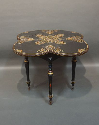 19th-century table in blackened wood, with...