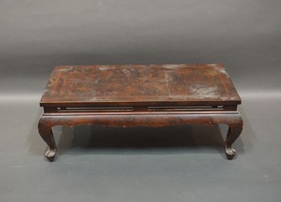 Asian coffee table in brown lacquered wood...