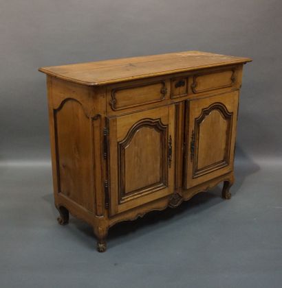 Buffet in molded natural wood, with two doors...