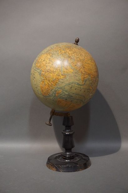 Globe on blackened wooden base, erected and...
