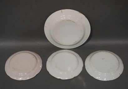 Dish and three plates in Eastern earthenware...