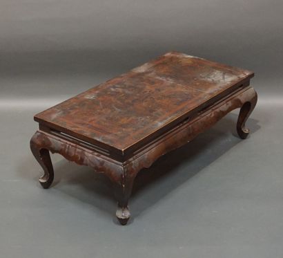Asian coffee table in brown lacquered wood...