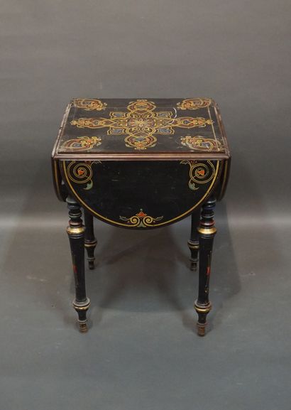 19th-century table in blackened wood, with...