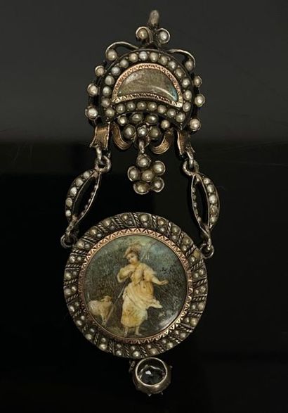 Pendentif en argent et vermeil orné de demi-perles,...