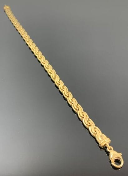 Bracelet en or jaune, maille corde.

L_18...