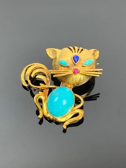 Broche en or jaune et turquoises figurant...