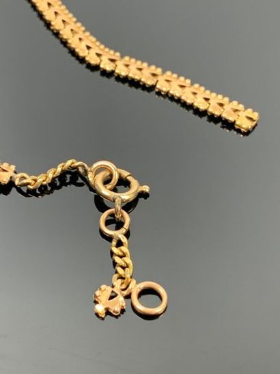 Bracelet souple articulé en or jaune.

L_19,5...