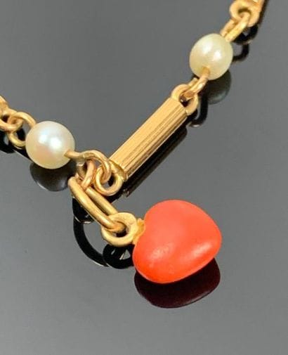 Bracelet en or jaune, perles et coeur en...