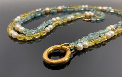 Collier de perles de pierres jaune et bleu...
