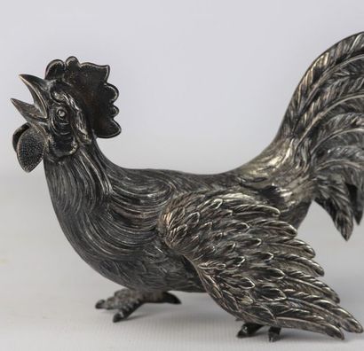 Coq en argent.

L_16,8 cm.

153 grammes,...