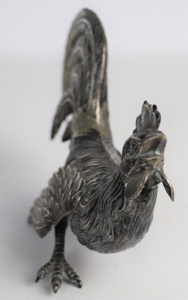 Coq en argent.

L_16,8 cm.

153 grammes,...