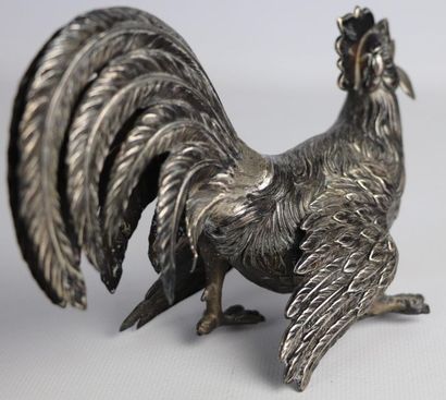 Coq en argent.

L_16,8 cm.

153 grammes,...