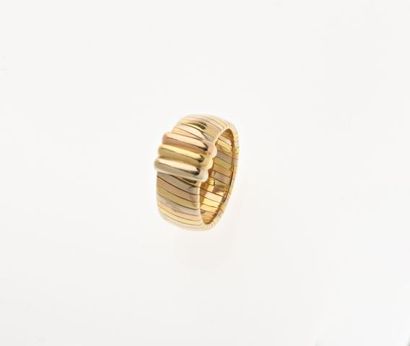 CARTIER. RING in 750 mm gold of three alternating...