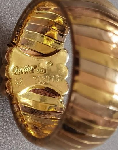 CARTIER. RING in 750 mm gold of three alternating...