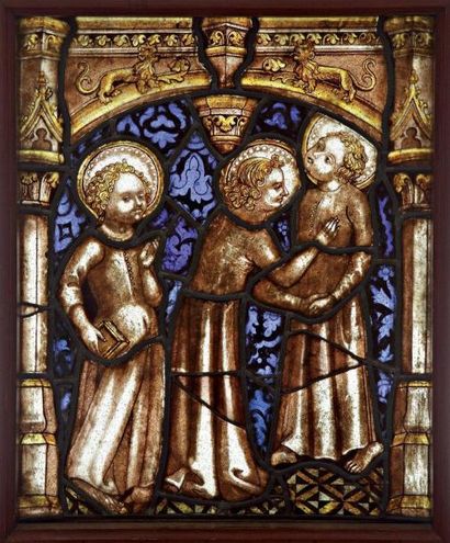 Vitrail figurant trois Saints personnages,...
