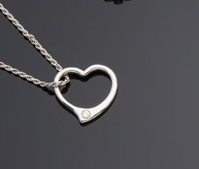 Collier pendentif en or gris 18k (750e),...