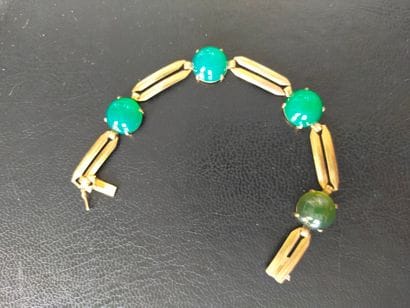 Bracelet articulé en or 18k (750e), composé...
