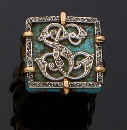 Bague en or 18k (750/00) et platine, ornée...