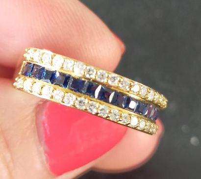 Bague en or rose 18k (750e) sertie d'un ligne...