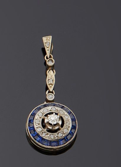 Pendentif en or gris 18k (750e), retenant...