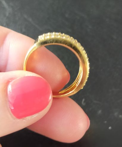 Bague en or rose 18k (750e) sertie d'un ligne...