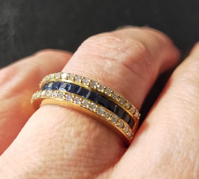 Bague en or rose 18k (750e) sertie d'un ligne...