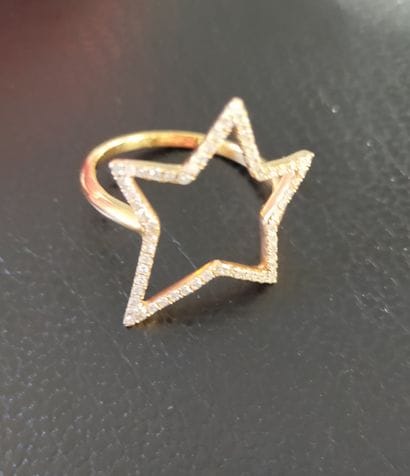 Bague en or rose 18k (750e) en forme d'étoile...