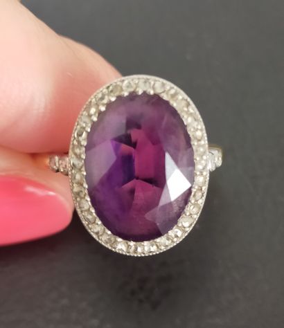 Bague en or 18k (750e) et platine, ornée...