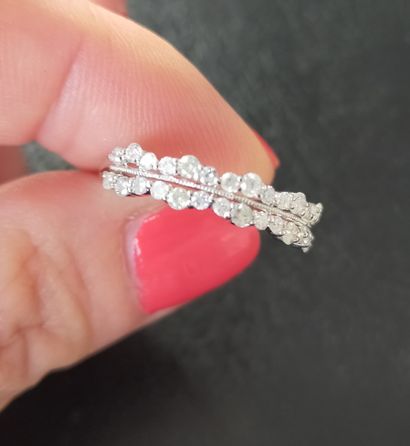 Bague en or gris18k (750e) serti de diamants
Poids...