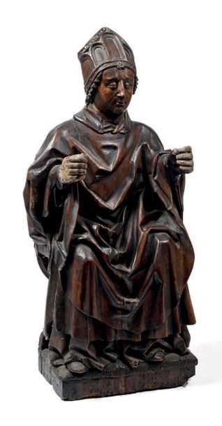 Sculpture en noyer: Evêque en majesté assis...