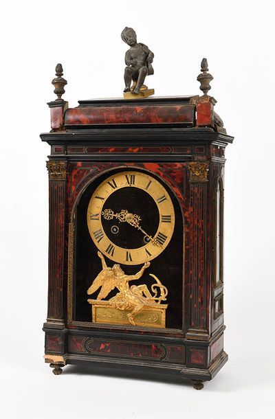 Pendule religieuse en bois teinté noir et...